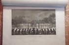 James Cook can be seen sitting in the middle